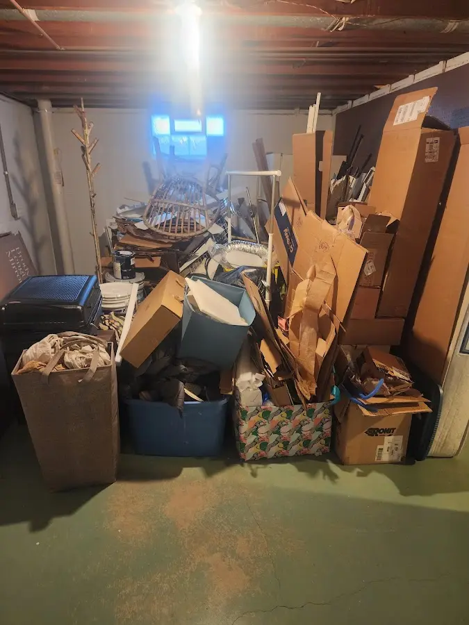 Roll-off dumpster container at job site for 20 Yard Dumpster Rental in Old Jamestown